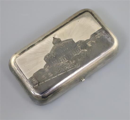 A 19th century Russian 84 zolotnik silver and niello cigarette case, decorated with a view of Pashkov House, Moscow,